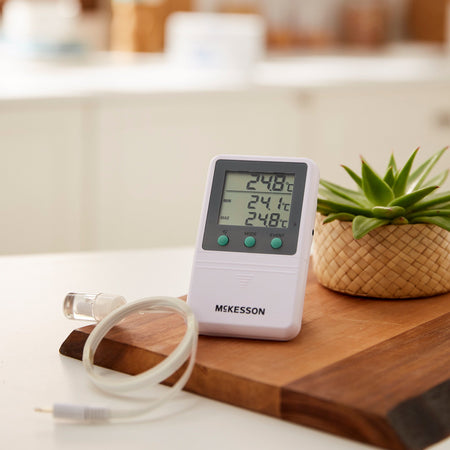 Digital Refrigerator / Freezer Thermometer with Alarm McKesson Fahrenheit / Celsius -58° to +158°F (-50° to +70°C) Glycol Bottle Probe Multiple Mounting Options Battery Operated